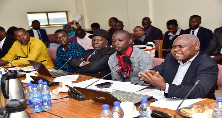 Pastor Male (R) as he made his presentation before the committee